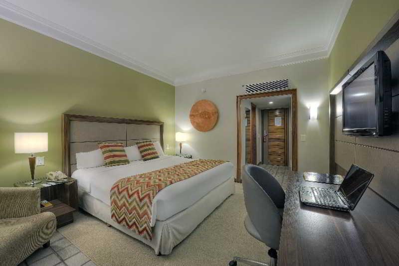 Hotel Deville Prime Salvador Exteriör bild A room at the hotel